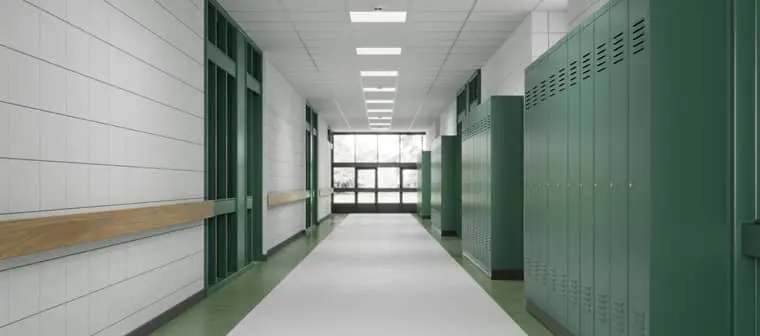 A wide school hallway illustrates this article about high school ministry.