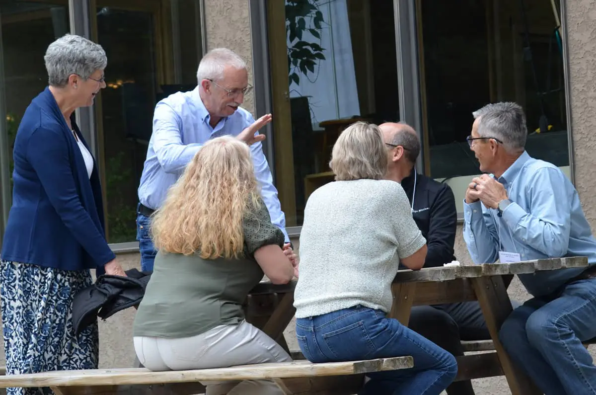 District Representatives in Canada talk with ministry leaders.